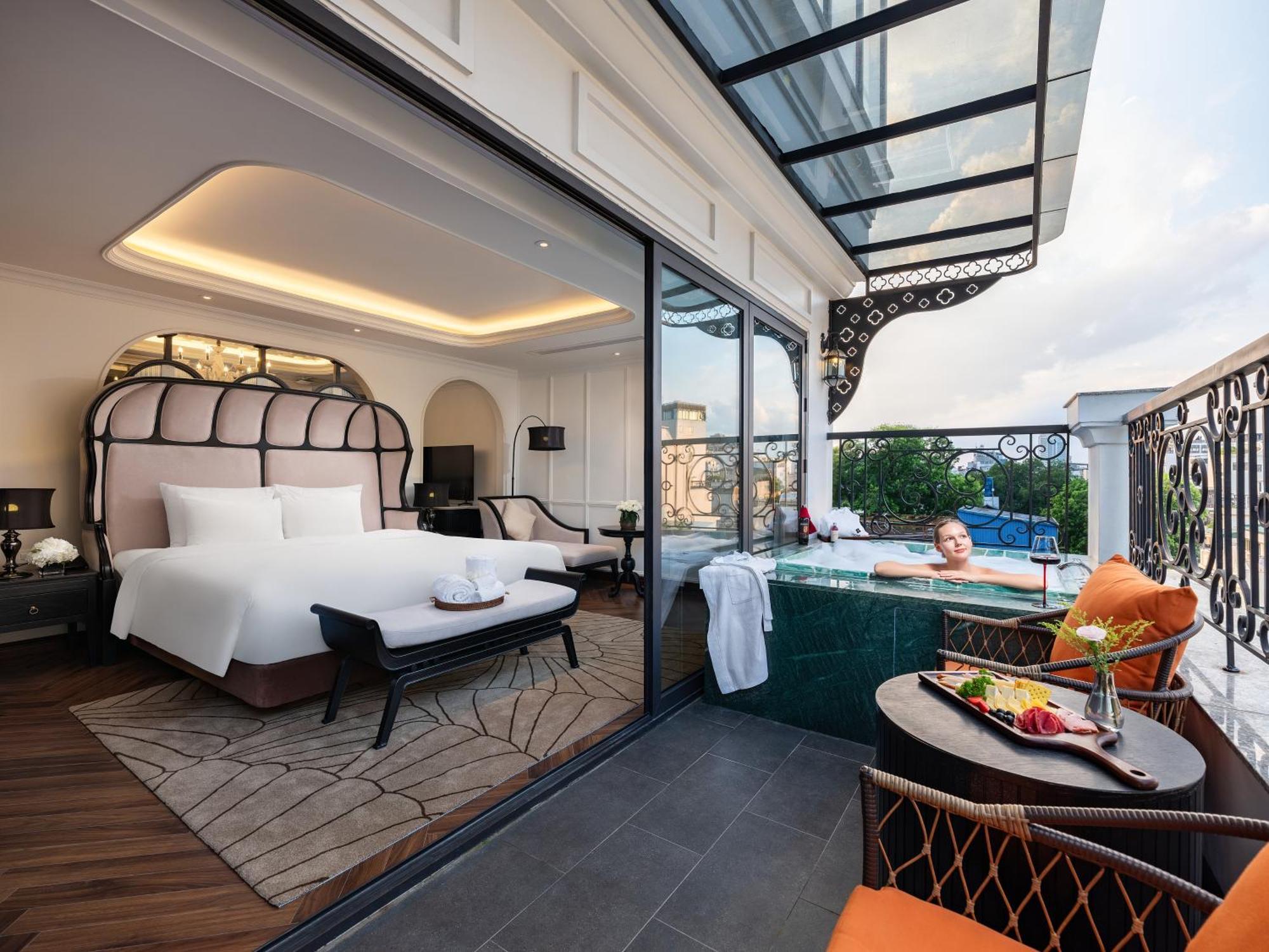 Grand Hotel Du Lac Hanoi Kültér fotó A suite at the hotel